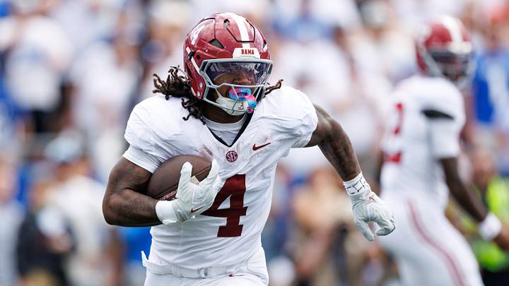 Sep 12, 2026; Lexington, Kentucky, USA;  Alabama Crimson Tide running back Daniel Hill (4) runs the ball during the first quarter against the Kentucky Wildcats at Kroger Field.  Mandatory Credit: Jordan Prather-Imagn Images