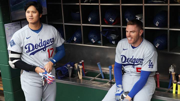 Jun 9, 2026; Pittsburgh, Pennsylvania, USA; Los Angeles Dodgers designated hitter Shohei Ohtani (17) and first baseman Freddie Freeman (5) prepare in the dugout before the first inning against the Pittsburgh Pirates at PNC Park. Mandatory Credit: Charles LeClaire-Imagn Images Jun 9, 2026; Pittsburgh, Pennsylvania, USA; Los Angeles Dodgers designated hitter Shohei Ohtani (17) and first baseman Freddie Freeman (5) prepare in the dugout before the first inning against the Pittsburgh Pirates at PNC Park. Mandatory Credit: Charles LeClaire-Imagn Images
