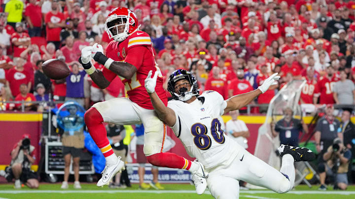 Sep 5, 2024; Kansas City, Missouri, USA; Kansas City Chiefs safety Chamarri Conner (27) narrowly misses intercepting a pass intended for Baltimore Ravens tight end Isaiah Likely (80) during the second half at GEHA Field at Arrowhead Stadium. Mandatory Credit: Denny Medley-Imagn Images
