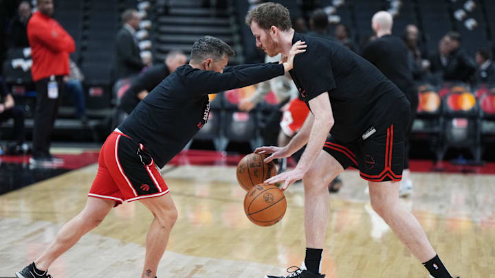 Jan 31, 2025; Toronto, Ontario, CAN; Toronto Raptors center Jakob Poeltl (19) performs dribbling drills during the warmup before a game against the Chicago Bulls at Scotiabank Arena. Mandatory Credit: Nick Turchiaro-Imagn Images