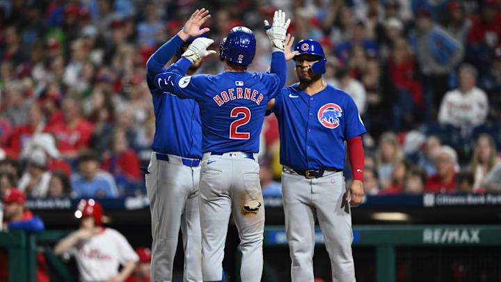 Sep 25, 2024; Philadelphia, Pennsylvania, USA; Chicago Cubs infielder Nico Hoerner (2) celebrates with teammates after hitting a three-run home run against the Philadelphia Phillies in the fourth inning at Citizens Bank Park. Sep 25, 2024; Philadelphia, Pennsylvania, USA; Chicago Cubs infielder Nico Hoerner (2) celebrates with teammates after hitting a three-run home run against the Philadelphia Phillies in the fourth inning at Citizens Bank Park.