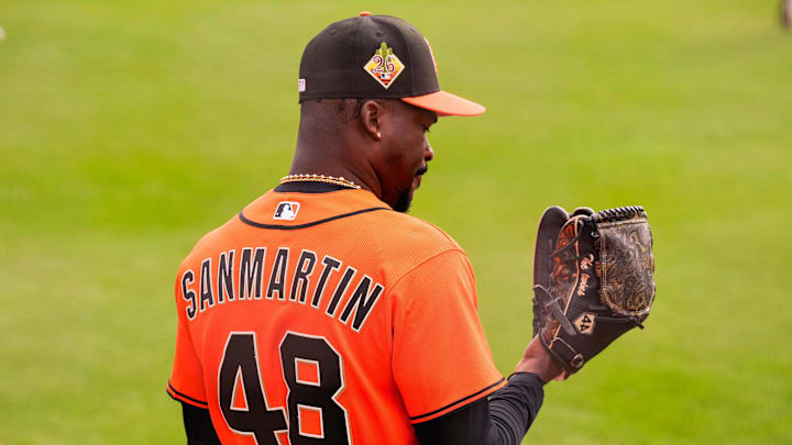 Feb 16, 2026; Scottsdale, AZ, USA; San Francisco Giants pitcher Reiver Sanmartin looks at his glove during workouts at Scottsdale Stadium in Scottsdale, Arizona. Mandatory Credit: Arianna Grainey-Imagn Images Feb 16, 2026; Scottsdale, AZ, USA; San Francisco Giants pitcher Reiver Sanmartin looks at his glove during workouts at Scottsdale Stadium in Scottsdale, Arizona. Mandatory Credit: Arianna Grainey-Imagn Images