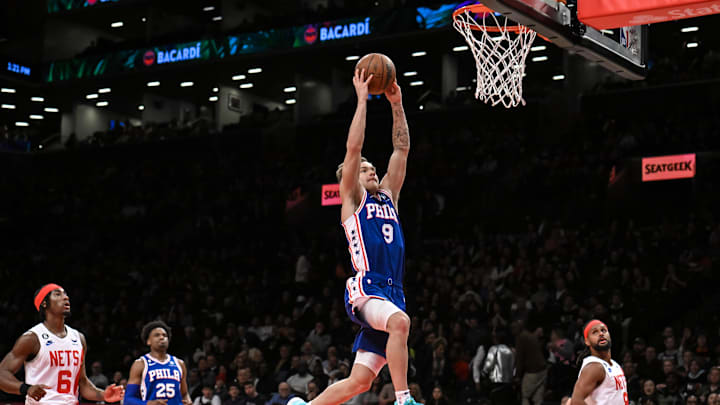 Apr 9, 2023; Brooklyn, New York, USA; Philadelphia 76ers guard Mac McClung (9) dunks the ball against the Brooklyn Nets during the first quarter at Barclays Center. Mandatory Credit: John Jones-Imagn Images