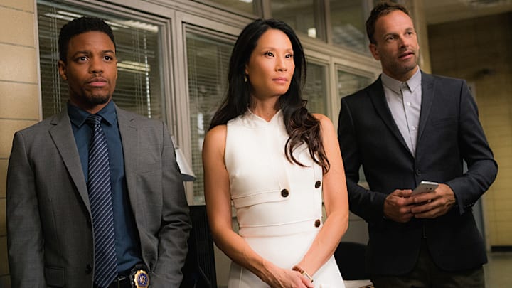 Elementary, Pictured (L-R) Jon Michael Hill as Detective Marcus Bell, Lucy Liu as Joan