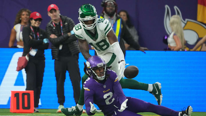 Oct 6, 2024; London, United Kingdom; Minnesota Vikings cornerback Stephon Gilmore (2) intercepts a pass intended for New York Jets wide receiver Mike Williams (18) in the fourth quarter at Tottenham Hotspur Stadium. 