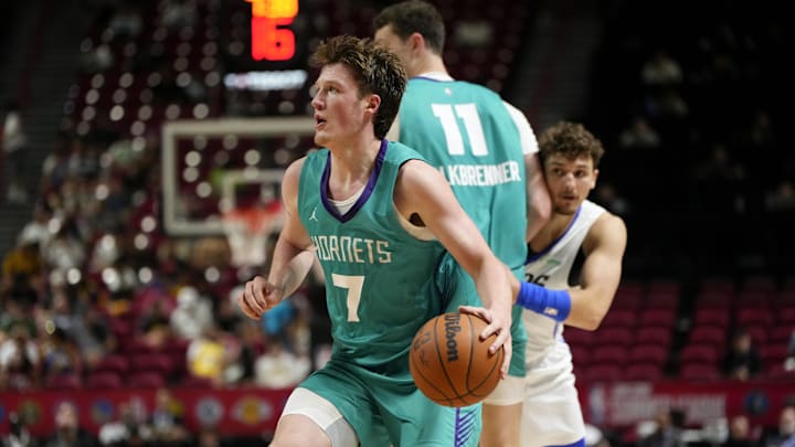 Jul 14, 2025; Las Vegas, NV, USA; Charlotte Hornets guard Kon Knueppel (7) controls the ball against the Dallas Mavericks during the second half of a NBA basketball game at the Thomas & Mack Center. Mandatory Credit: Lucas Peltier-Imagn Images
