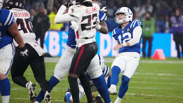 Nov 9, 2025; Berlin, Germany; Indianapolis Colts place kicker Michael Badgley (12) attempts a field goal against the Atlanta Falcons during the NFL Berlin Game at Olympic Stadium. Mandatory Credit: Kirby Lee-Imagn Images