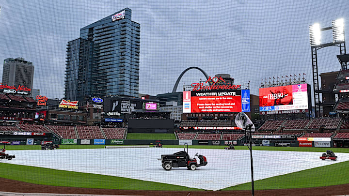 May 8, 2024; St. Louis, Missouri, USA; A general view of the tarp on the field as storms move through the St. Louis region delaying a game between the St. Louis Cardinals and the New York Mets at Busch Stadium. Mandatory Credit: Jeff Curry-Imagn Images May 8, 2024; St. Louis, Missouri, USA; A general view of the tarp on the field as storms move through the St. Louis region delaying a game between the St. Louis Cardinals and the New York Mets at Busch Stadium. Mandatory Credit: Jeff Curry-Imagn Images