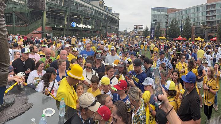 Jesse Cole signing autographs for fans at a recent Banana Ball game at Historic Wrigley Field, Chicago.