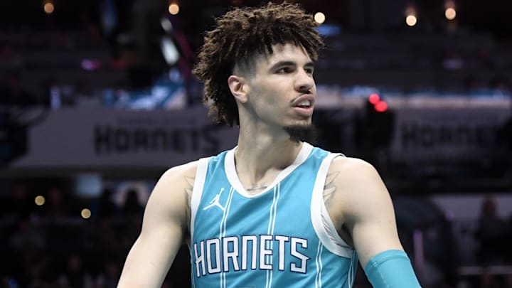 Mar 25, 2025; Charlotte, North Carolina, USA;  Charlotte Hornets guard LaMelo Ball (1) looks around after being called for a foul during the second half against the Orlando Magic at the Spectrum Center. Mandatory Credit: Sam Sharpe-Imagn Images