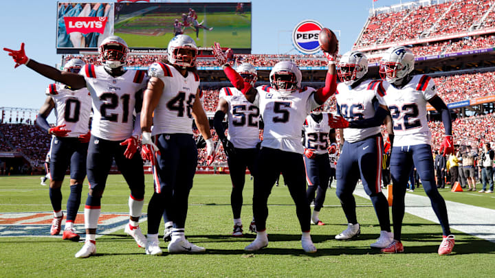 Sep 29, 2024; Santa Clara, California, USA; New England Patriots safety Jabrill Peppers (5) celebrates with teammates after intercepting a pass during the fourth quarter against the San Francisco 49ers at Levi's Stadium.