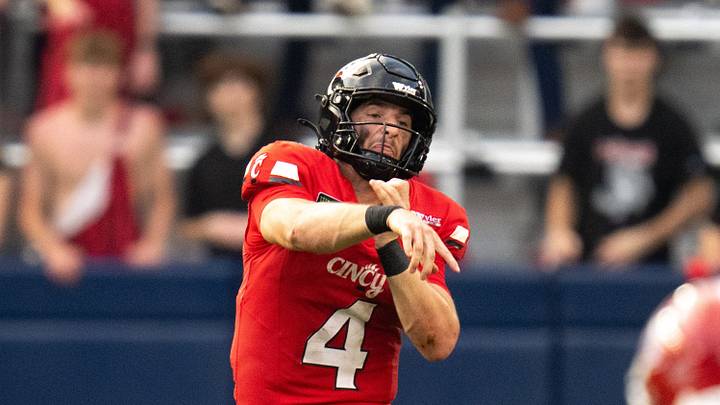 Cincinnati Bearcats quarterback JC French IV (4) throws a pass in the fourth quarter of the football game between Cincinnati Bearcats and Miami RedHawks at TQL Stadium in Cincinnati on Saturday, September 19, 2026. Cincinnati Bearcats quarterback JC French IV (4) throws a pass in the fourth quarter of the football game between Cincinnati Bearcats and Miami RedHawks at TQL Stadium in Cincinnati on Saturday, September 19, 2026.