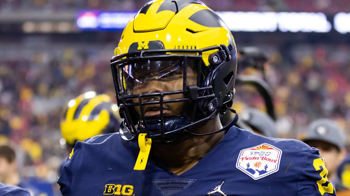 Dec 31, 2022; Glendale, Arizona, USA; Michigan Wolverines defensive lineman Rayshaun Benny (26) against the TCU Horned Frogs during the 2022 Fiesta Bowl at State Farm Stadium. Mandatory Credit: Mark J. Rebilas-Imagn Images