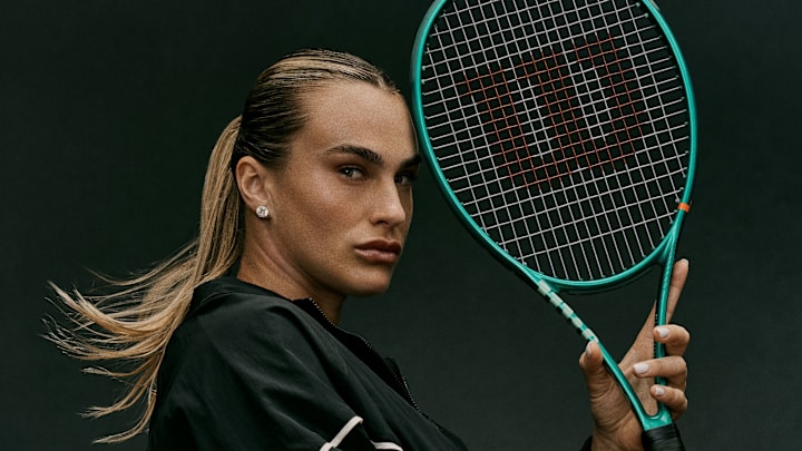 Aryna Sabalenka poses with new Wilson Blade v10. 