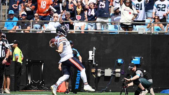 Chicago Bears quarterback Caleb Williams (18) runs the ball for a touchdown in the second quarter against the Carolina Panthers at Bank of America Stadium. Mandatory Credit: Bob Donnan-Imagn Images Chicago Bears quarterback Caleb Williams (18) runs the ball for a touchdown in the second quarter against the Carolina Panthers at Bank of America Stadium. Mandatory Credit: Bob Donnan-Imagn Images