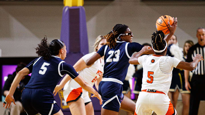 Webb School-Bell Buckle Feet Rhema Collins (23) steals the ball away from Middle Tennessee Christian Cougars guard Autumn E Davis (5) during the division II championships at the Hooper Eblen Center in Cookeville, Tenn. on Mar. 4, 2023.

Tssaa Basketball Division Ii Championships Photos