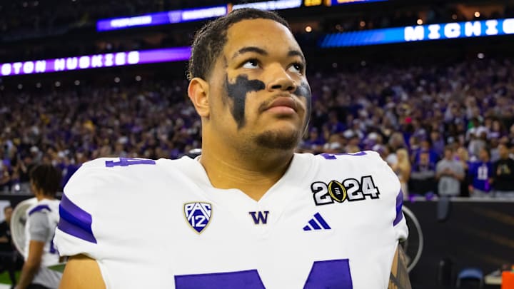 Jan 8, 2024; Houston, TX, USA; Washington Huskies offensive lineman Kahlee Tafai (74) against the Michigan Wolverines during the 2024 College Football Playoff national championship game at NRG Stadium. Mandatory Credit: Mark J. Rebilas-Imagn Images Jan 8, 2024; Houston, TX, USA; Washington Huskies offensive lineman Kahlee Tafai (74) against the Michigan Wolverines during the 2024 College Football Playoff national championship game at NRG Stadium. Mandatory Credit: Mark J. Rebilas-Imagn Images