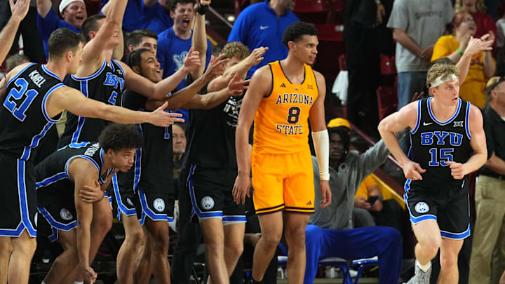 Feb 26, 2025; Tempe, Arizona, USA; Brigham Young Cougars forward Richie Saunders (15) reacts after making a three-point basket against Arizona State Sun Devils forward Basheer Jihad (8) during the second half at Desert Financial Arena. Mandatory Credit: Joe Camporeale-Imagn Images