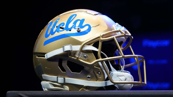 Jul 29, 2022; Los Angeles, CA, USA; A detailed view of UCLA Bruins helmet during Pac-12 Media Day at Novo Theater. Mandatory Credit: Kirby Lee-Imagn Images Jul 29, 2022; Los Angeles, CA, USA; A detailed view of UCLA Bruins helmet during Pac-12 Media Day at Novo Theater. Mandatory Credit: Kirby Lee-Imagn Images