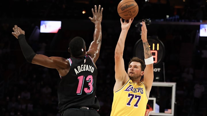 Luka Doncic shoots over Bam Adebayo during his 60-point performance against the Miami Heat. Luka Doncic shoots over Bam Adebayo during his 60-point performance against the Miami Heat.