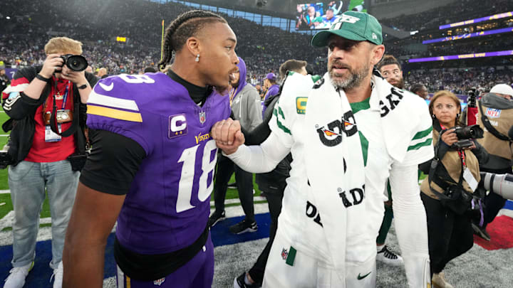 Aaron Rodgers speaks with Vikings wide receiver Justin Jefferson after a game at Tottenham Hotspur Stadium. Aaron Rodgers speaks with Vikings wide receiver Justin Jefferson after a game at Tottenham Hotspur Stadium.