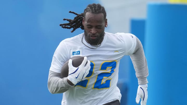 Los Angeles Chargers running back Najee Harris carries the ball during offseason workouts