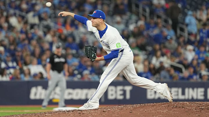 Sep 27, 2024; Toronto, Ontario, CAN; Toronto Blue Jays relief pitcher Brett de Geus (31) throws a pitch against the Miami Marlins during the seventh inning at Rogers Centre. Mandatory Credit: Nick Turchiaro-Imagn Images