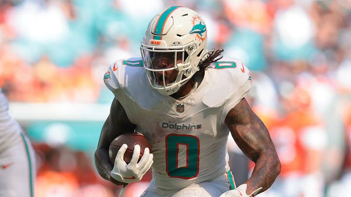 Miami Dolphins running back Ollie Gordon II (0) runs with the ball against the Cincinnati Bengals during the third quarter at Hard Rock Stadium. Miami Dolphins running back Ollie Gordon II (0) runs with the ball against the Cincinnati Bengals during the third quarter at Hard Rock Stadium.