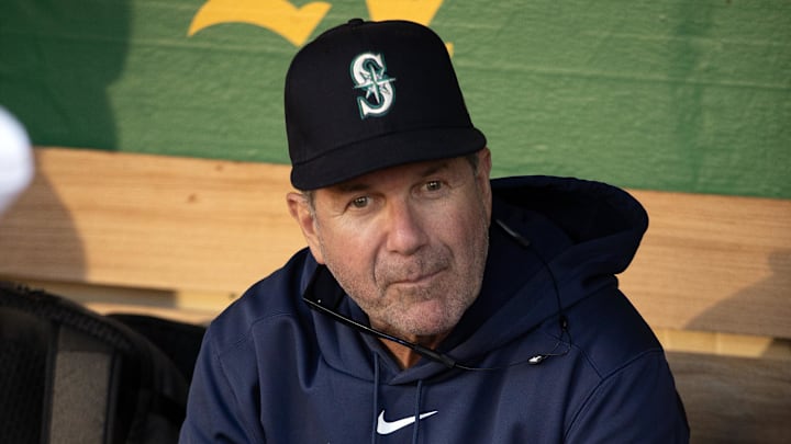 Seattle Mariners hitting coach Edgar Martinez (11) sits in the dugout before his team takes on the Oakland Athletics at Oakland-Alameda County Coliseum on Sept 3, 2024.