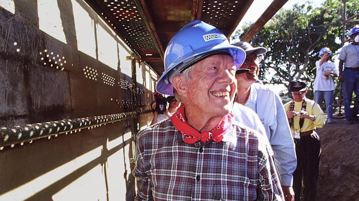 Pres. Jimmy Carter helps build a house during Habitat for Humanity International's Jimmy And Rosalynn Carter Work Project in Durban, South Africa in 2002. Pres. Jimmy Carter helps build a house during Habitat for Humanity International's Jimmy And Rosalynn Carter Work Project in Durban, South Africa in 2002.
