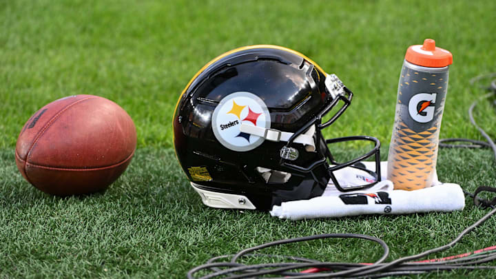 Aug 16, 2025; Pittsburgh, Pennsylvania, USA; A Pittsburgh Steelers helmet sits on the turf against the Tampa Bay Buccaneers during the first quarter at Acrisure Stadium. Mandatory Credit: Barry Reeger-Imagn Images