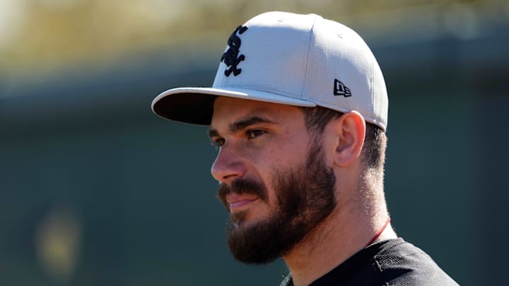Feb 19, 2024; Glendale, AZ, USA; Chicago White Sox starting pitcher Dylan Cease (84) looks on during