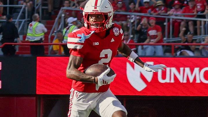 Jacory Barney Jr. returns a punt 57 yards against Michigan State last season.