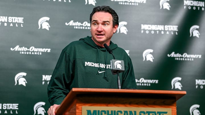 Michigan State coach Jonathan Smith talks the media on the first national signing day for college