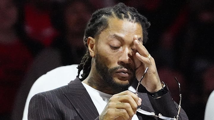 Jan 4, 2025; Chicago, Illinois, USA; Chicago Bulls and New York Knicks former player Derrick Rose reacts as he is honored at halftime of a game between the Chicago Bulls and the New York Knicks at United Center. Mandatory Credit: David Banks-Imagn Images