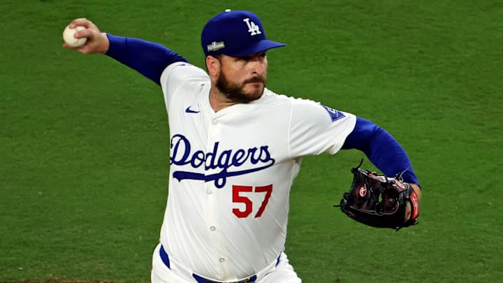 Oct 20, 2024; Los Angeles, California, USA; Los Angeles Dodgers pitcher Ryan Brasier (57) during the fifth inning during game six of the NLCS for the 2024 MLB playoffs at Dodger Stadium. Mandatory Credit: Kiyoshi Mio-Imagn Images