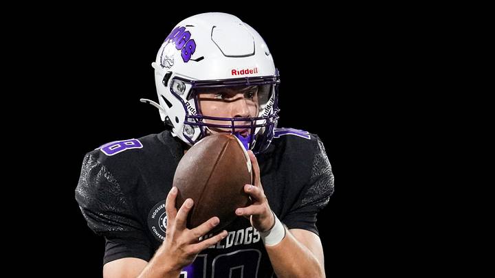 Brownsburg Bulldogs Oscar Frye (18) catches the snap Friday, Sept. 11, 2026, during a game at Brownsburg High School in Brownsburg, Ind. Frye is on our latest ballot for Indiana High School Football Player of the Week. Brownsburg Bulldogs Oscar Frye (18) catches the snap Friday, Sept. 11, 2026, during a game at Brownsburg High School in Brownsburg, Ind. Frye is on our latest ballot for Indiana High School Football Player of the Week.