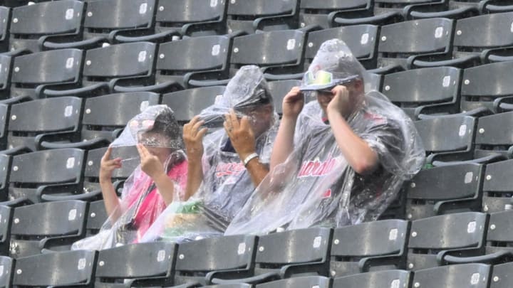 Jun 23, 2024; Cleveland, Ohio, USA; Fans sit in the stands during a rain delay between the Cleveland Guardians and the Toronto Blue Jays at Progressive Field. Mandatory Credit: David Richard-USA TODAY Sports