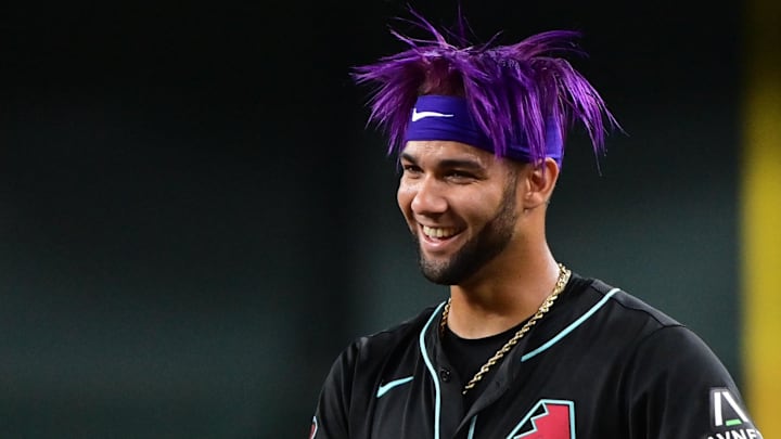 Jul 29, 2024; Phoenix, Arizona, USA;  Arizona Diamondbacks outfielder Lourdes Gurriel Jr. (12) looks on in the eighth inning against the Washington Nationals at Chase Field. Mandatory Credit: Matt Kartozian-Imagn Images