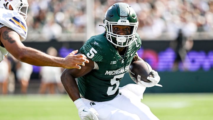 Michigan State's Nathan Carter runs for a gain against Prairie View A&M during the first quarter on Saturday, Sept. 14, 2024, at Spartan Stadium in East Lansing.