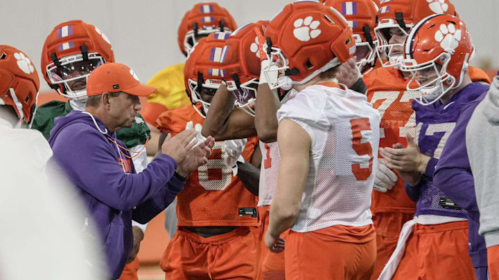 Clemson head coach Dabo Swinney with players during the first Spring football practice open to media in Clemson, SC Friday, Feb 27, 2026.