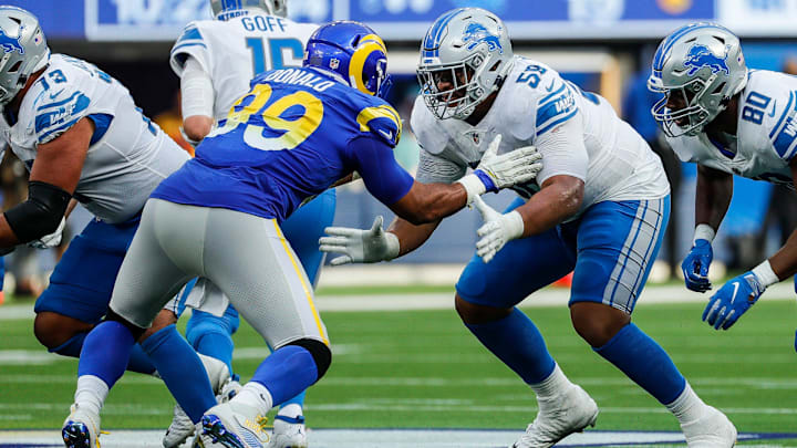 Detroit Lions offensive tackle Penei Sewell sets up to block Los Angeles Rams defensive end Aaron Donald during the second half at SoFi Stadium in Inglewood, Calif. on Sunday, Oct. 24, 2021. Detroit Lions offensive tackle Penei Sewell sets up to block Los Angeles Rams defensive end Aaron Donald during the second half at SoFi Stadium in Inglewood, Calif. on Sunday, Oct. 24, 2021.