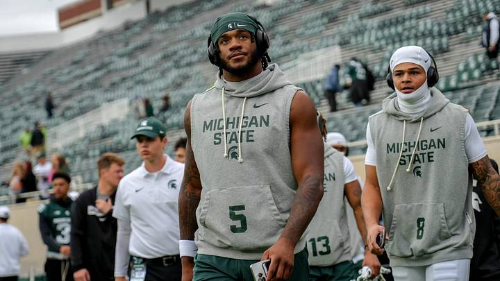 Michigan State's Jordan Hall walk back to the locker room before the football game against UCLA on Saturday, Oct. 11, 2025, at Spartan Stadium in East Lansing. Michigan State's Jordan Hall walk back to the locker room before the football game against UCLA on Saturday, Oct. 11, 2025, at Spartan Stadium in East Lansing.