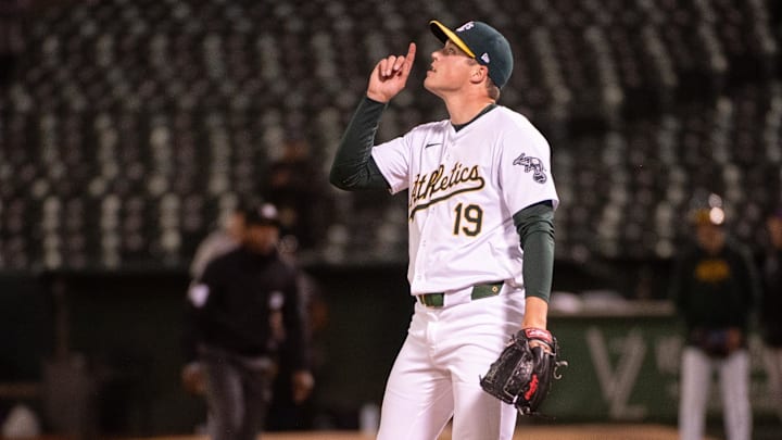 May 21, 2024; Oakland, California, USA; Oakland Athletics pitcher Mason Miller (19) celebrates after defeating the Colorado Rockies 5-4 at Oakland-Alameda County Coliseum.