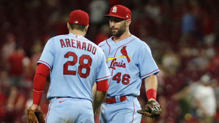 Jul 23, 2022; Cincinnati, Ohio, USA; St. Louis Cardinals first baseman Paul Goldschmidt (46) and third baseman Nolan Arenado (28) react after the Cardinals defeated the Cincinnati Reds at Great American Ball Park. Mandatory Credit: David Kohl-Imagn Images Jul 23, 2022; Cincinnati, Ohio, USA; St. Louis Cardinals first baseman Paul Goldschmidt (46) and third baseman Nolan Arenado (28) react after the Cardinals defeated the Cincinnati Reds at Great American Ball Park. Mandatory Credit: David Kohl-Imagn Images