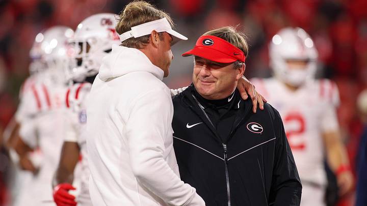 Nov 11, 2023; Athens, Georgia, USA; Mississippi Rebels head coach Lane Kiffin talks to Georgia Bulldogs head coach Kirby Smart before a game at Sanford Stadium. Mandatory Credit: Brett Davis-Imagn Images Nov 11, 2023; Athens, Georgia, USA; Mississippi Rebels head coach Lane Kiffin talks to Georgia Bulldogs head coach Kirby Smart before a game at Sanford Stadium. Mandatory Credit: Brett Davis-Imagn Images