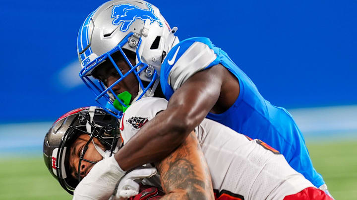 Buccaneers wide receiver Mike Evans (13) makes a catch against Lions cornerback Terrion Arnold (0) Buccaneers wide receiver Mike Evans (13) makes a catch against Lions cornerback Terrion Arnold (0)