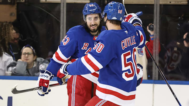 Apr 17, 2025; New York, New York, USA;  New York Rangers center Mika Zibanejad (93) celebrates with left wing Will Cuylle (50) after scoring a goal in the third period against the Tampa Bay Lightning at Madison Square Garden. Mandatory Credit: Wendell Cruz-Imagn Images