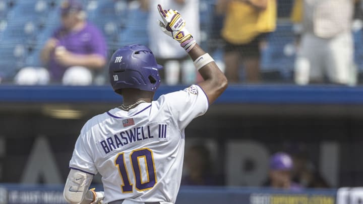 May 25, 2024; Hoover, AL, USA; LSU Tigers shortstop Michael Braswell (10) celebrates after his solo hom run against the South Carolina Gamecocks during the SEC Baseball Tournament at Hoover Metropolitan Stadium. Mandatory Credit: Vasha Hunt-Imagn Images