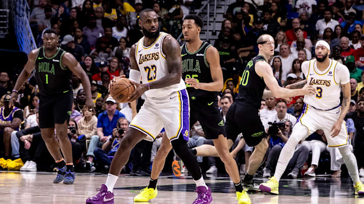Los Angeles Lakers forward LeBron James (23) looks to pass the ball against New Orleans Pelicans guard Trey Murphy III (25) during the first half at Smoothie King Center. Mandatory Credit: Stephen Lew-Imagn Images